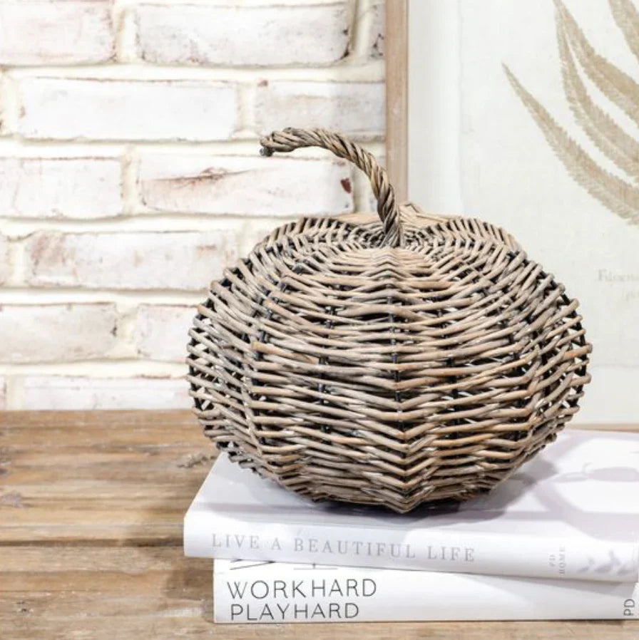 Wicker basket on top of books with a rustic background