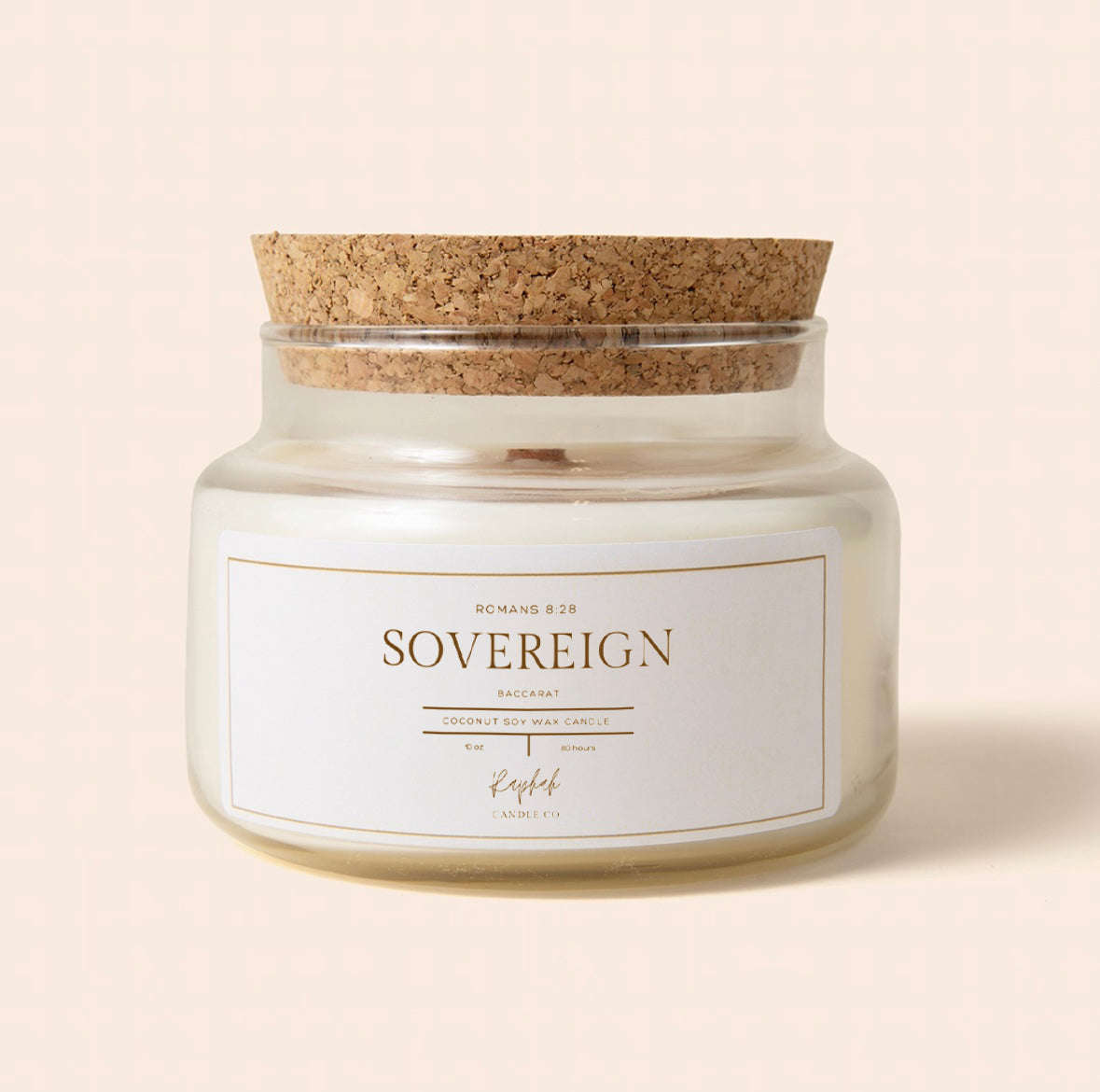 Candle jar labeled 'Milk & Honey' with a cork lid on a light background