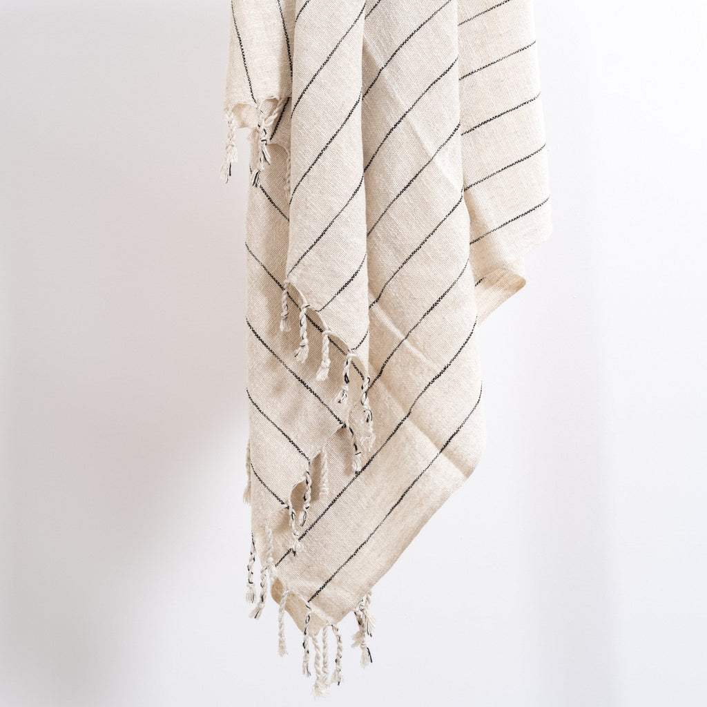 Soft neutral hand towel with delicate fringe detailing and timeless spa-inspired texture for elevated bath styling | Sorelle Rossi Shoppe