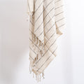 Soft neutral hand towel with delicate fringe detailing and timeless spa-inspired texture for elevated bath styling | Sorelle Rossi Shoppe