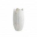 White marble vase with ribbed texture on a white background