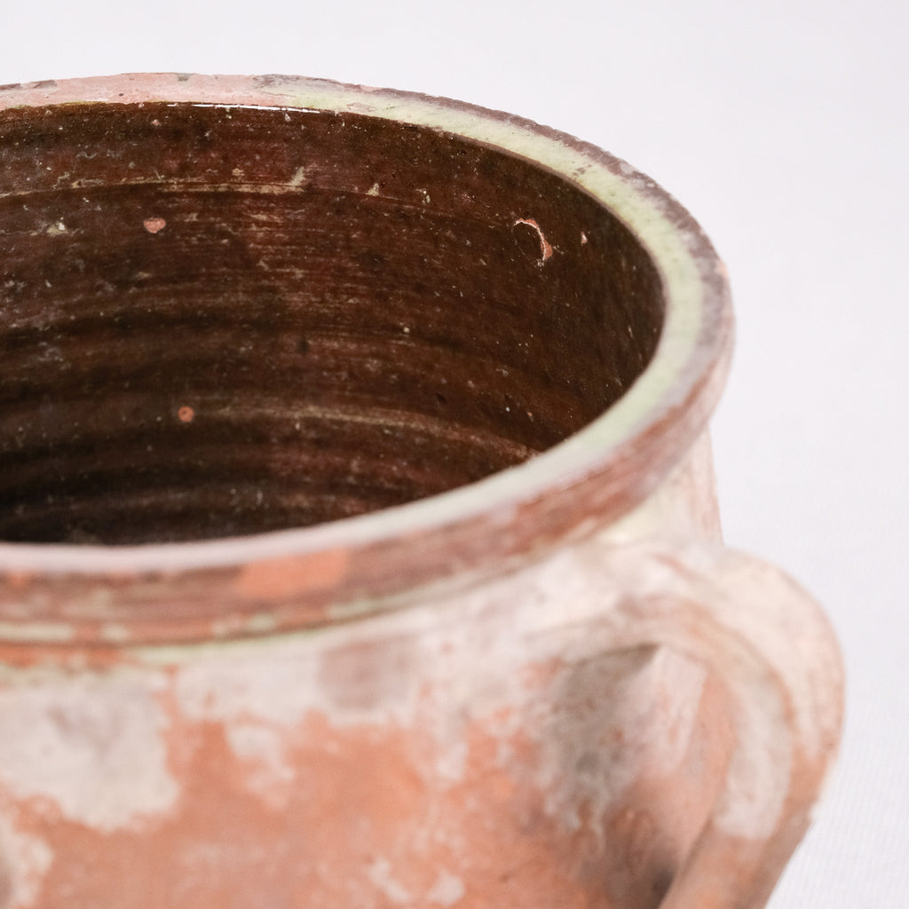 Close-up of a terracotta pot with a white background