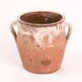 Terracotta pot with handles on a white background