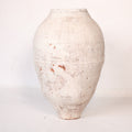 White ceramic vase on a white background