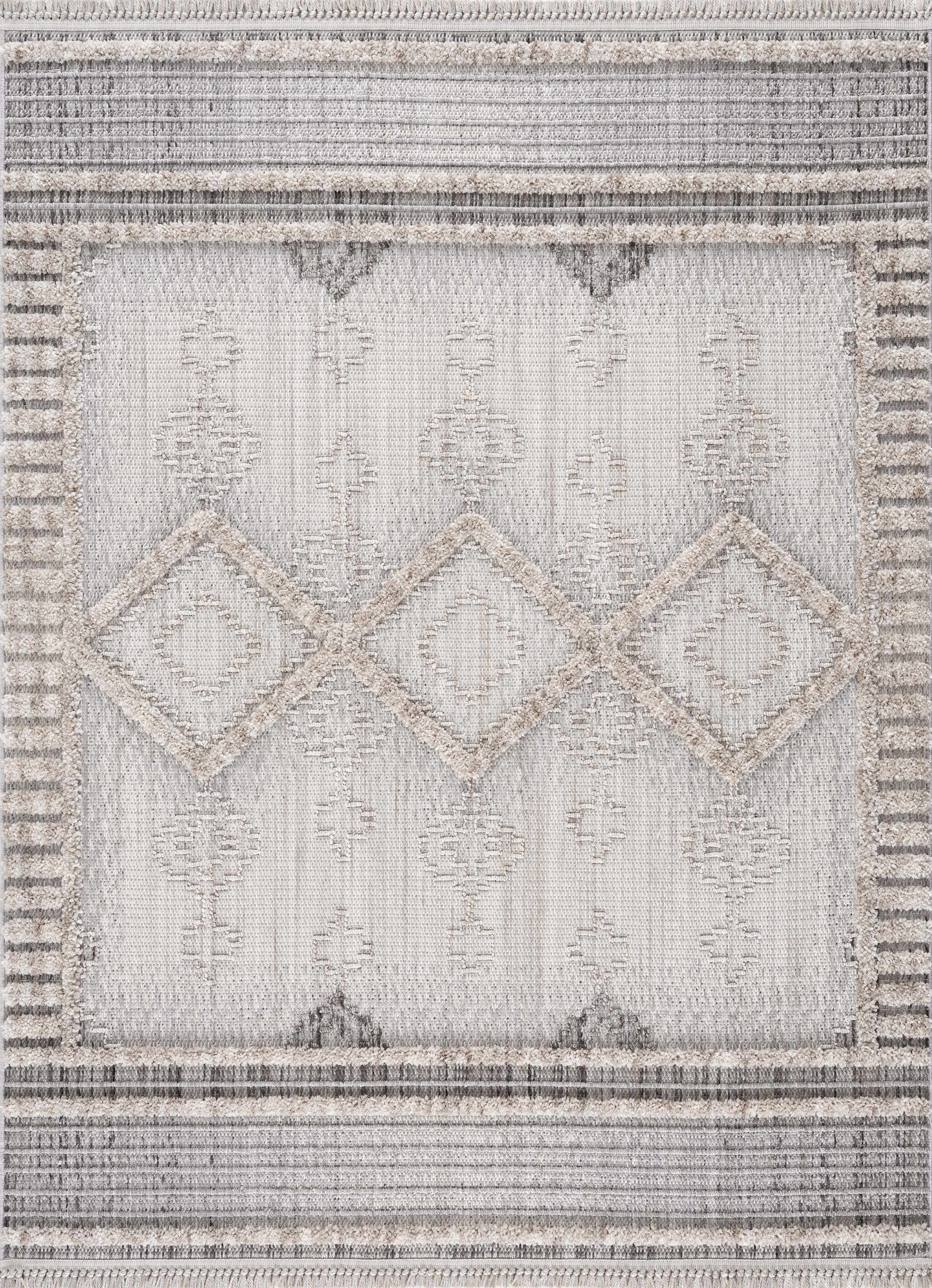 Patterned rug with geometric design in neutral colors