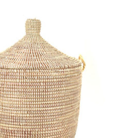 Woven basket with a lid on a white background