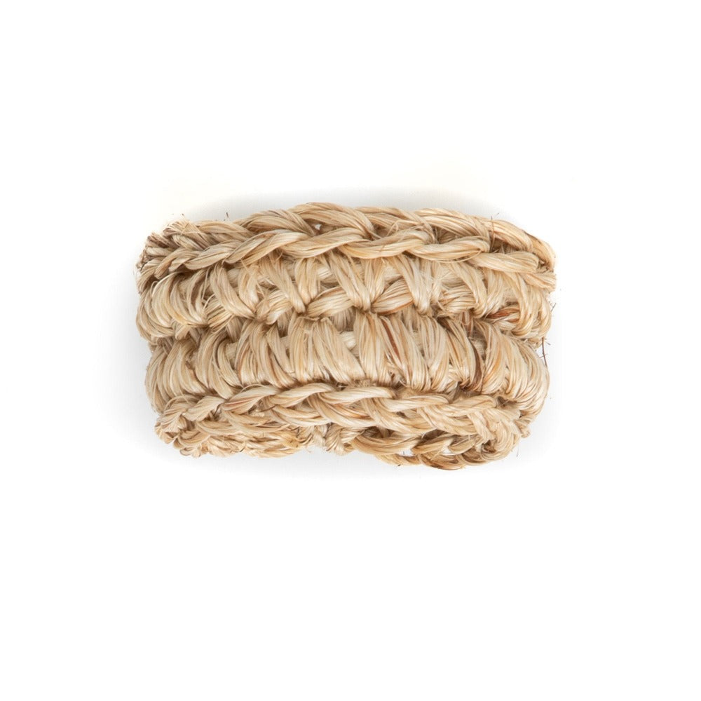 Woven beige soap dish on a white background