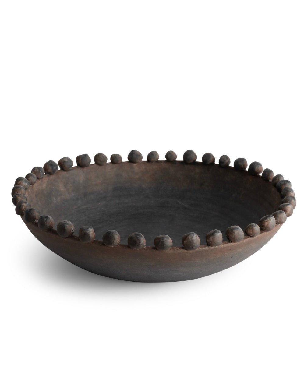 Decorative black bowl with bead-like embellishments on a white background
