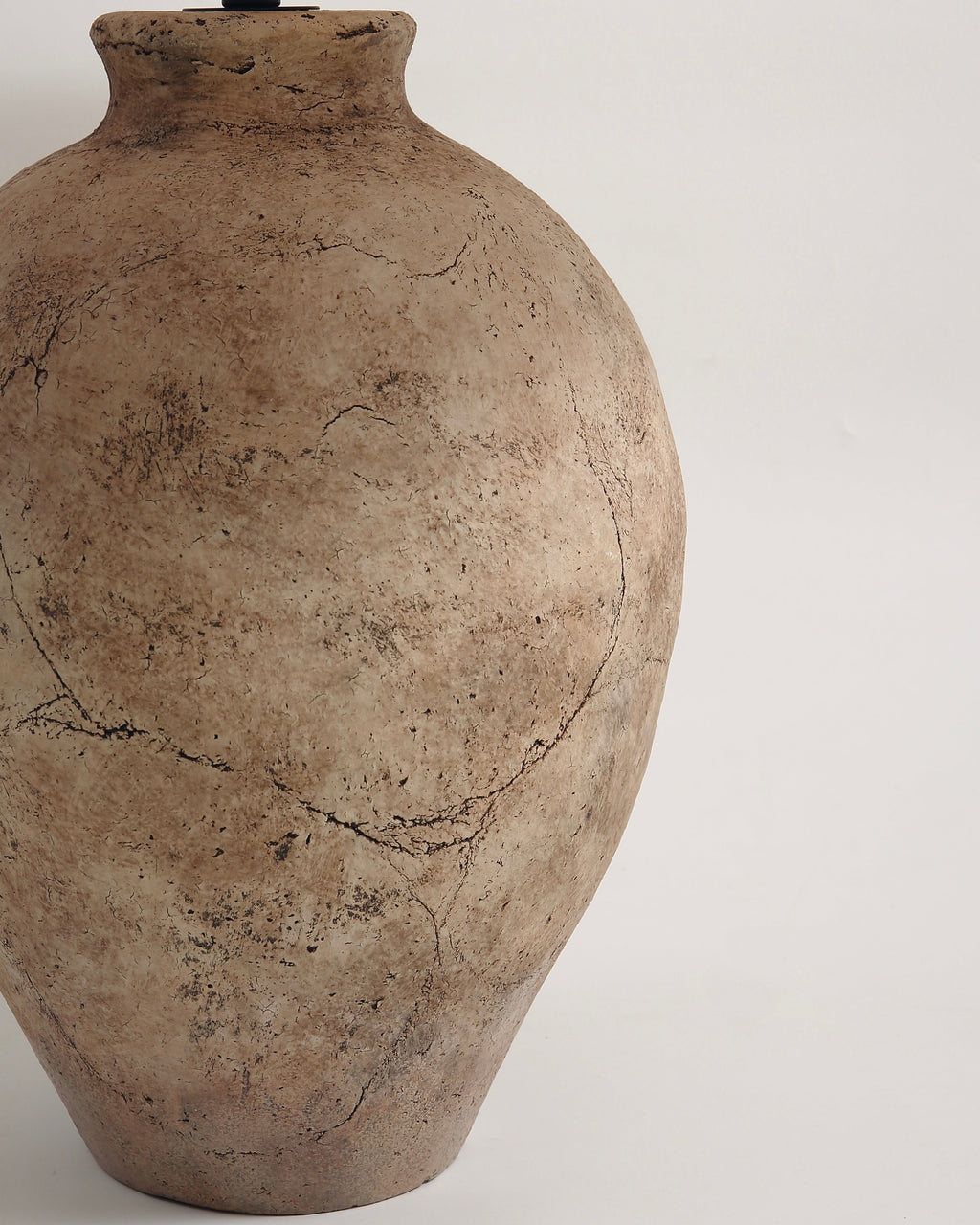 Brown ceramic vase on a white background