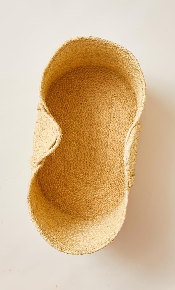 Gold sandal on a light beige background