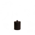 A small cylindrical dark brown textured container with a matching lid and a small spherical knob on top, set against a solid white background.