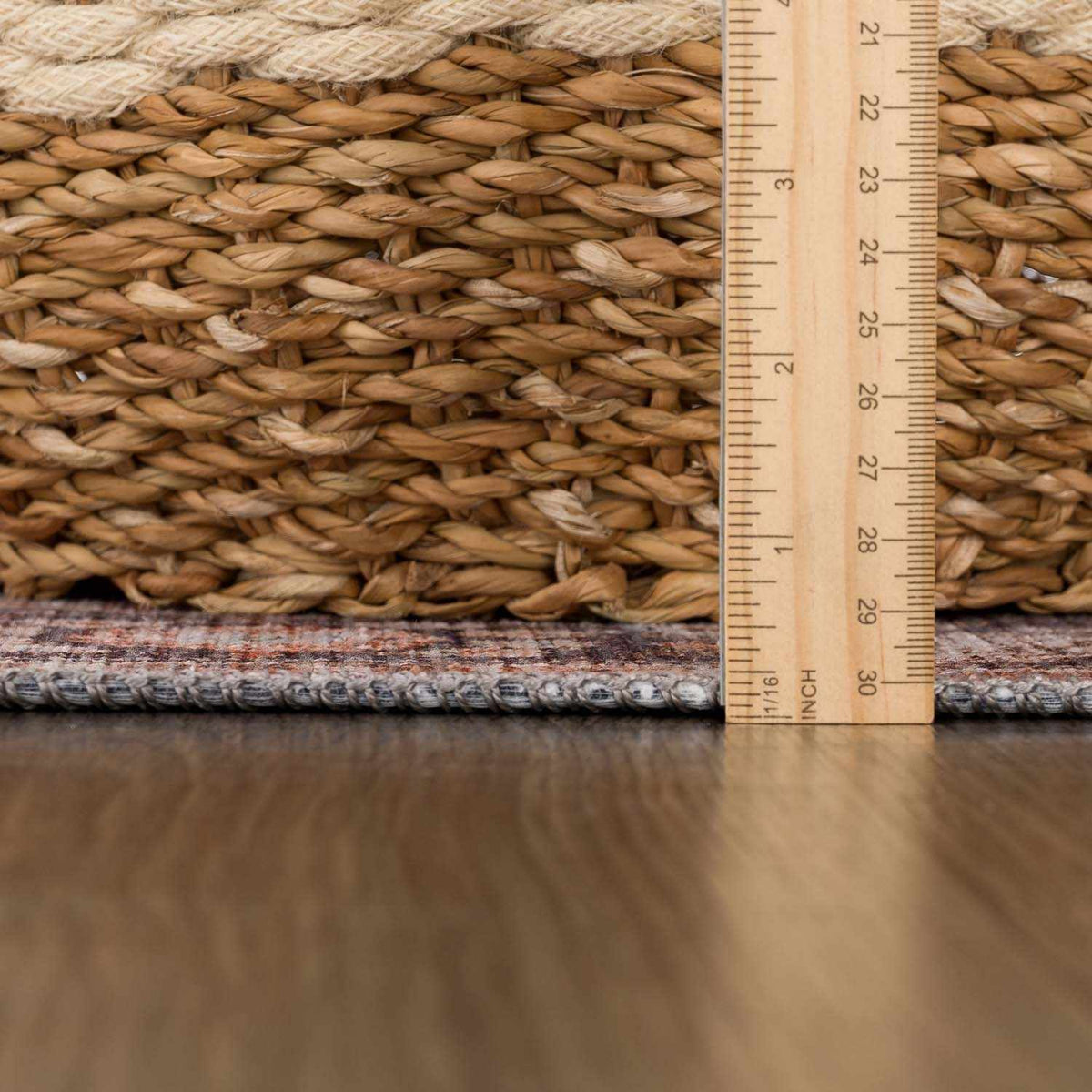 Woven material with a ruler for scale on a wooden surface