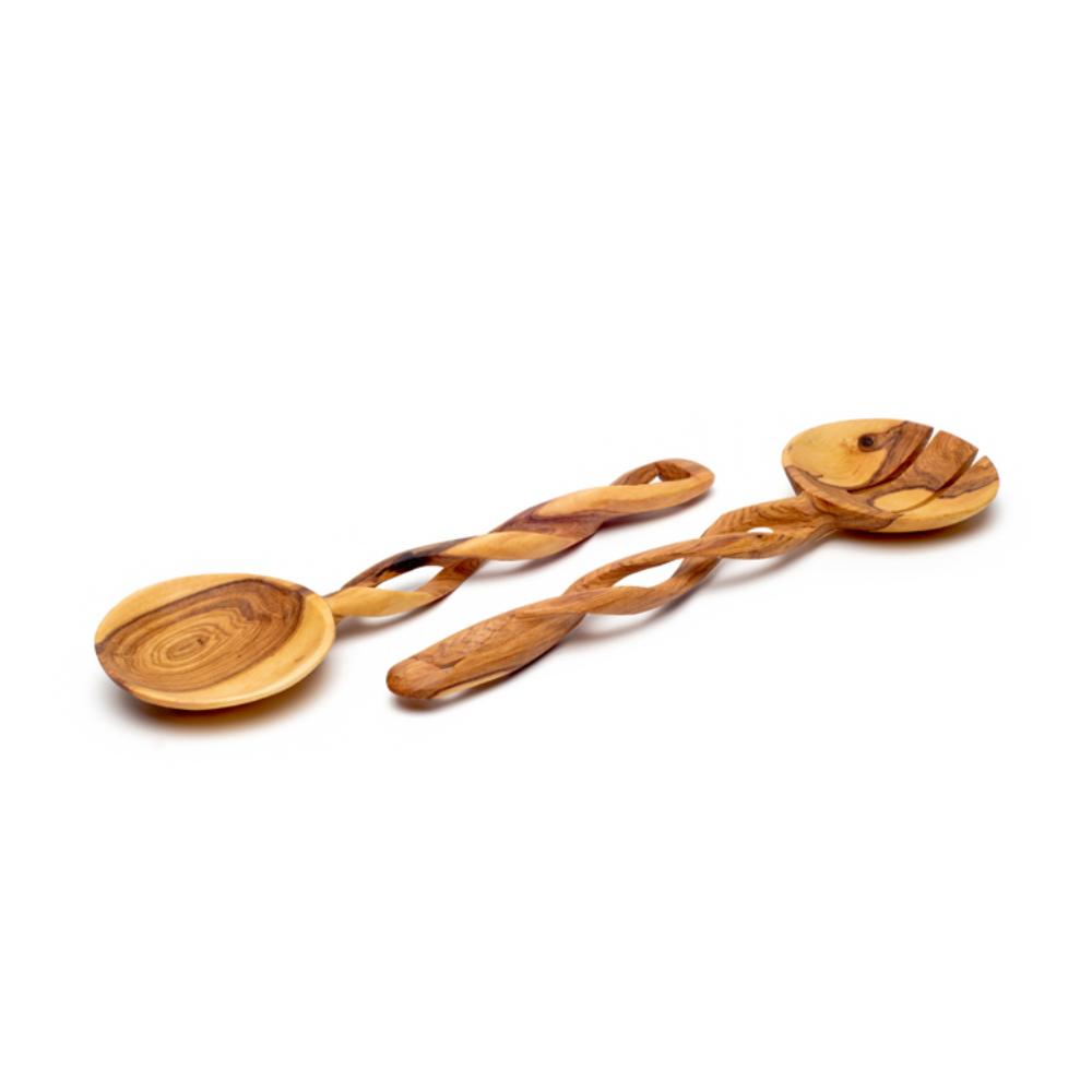 Two wooden spoons with twisted handles on a white background