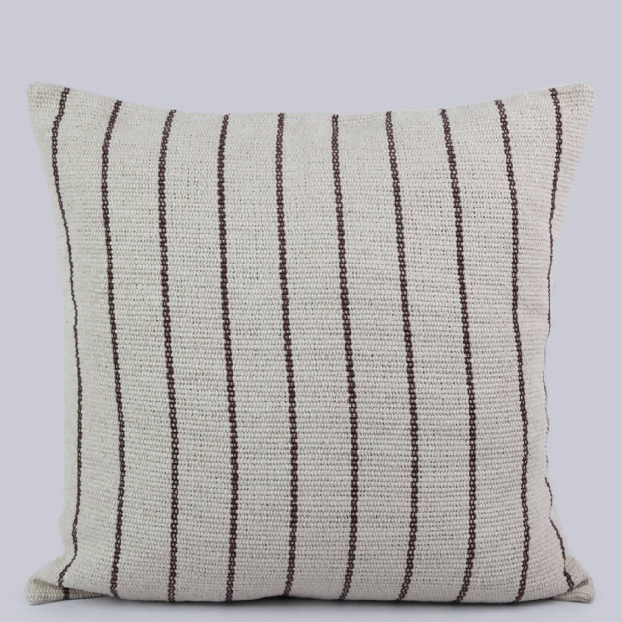 Handwoven heavy cotton striped pillow cover in a soft neutral color palette, artisan-crafted using traditional backstrap weaving for modern organic, farmhouse, coastal, and Scandinavian home décor.