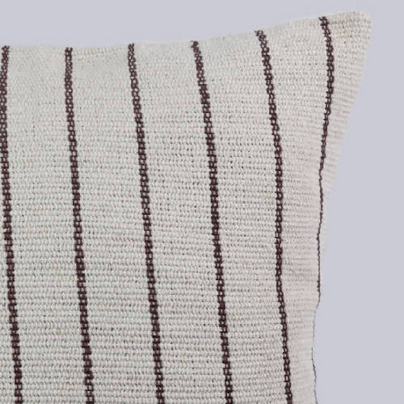 Handwoven heavy cotton striped pillow cover in a soft neutral color palette, artisan-crafted using traditional backstrap weaving for modern organic, farmhouse, coastal, and Scandinavian home décor.