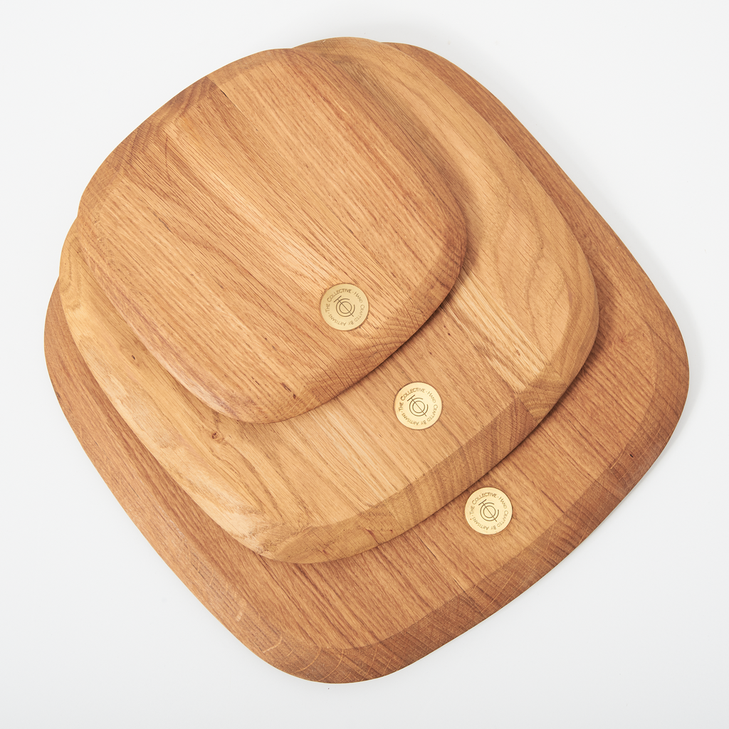 Wooden hat with gold buttons on a white background