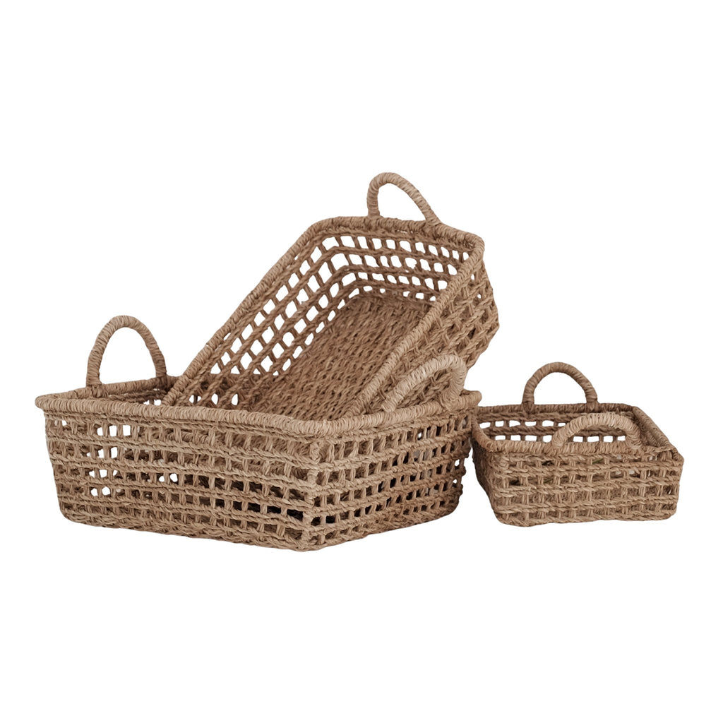 Set of three woven baskets with handles on a white background