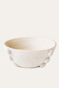 Textured woven basket on a white background