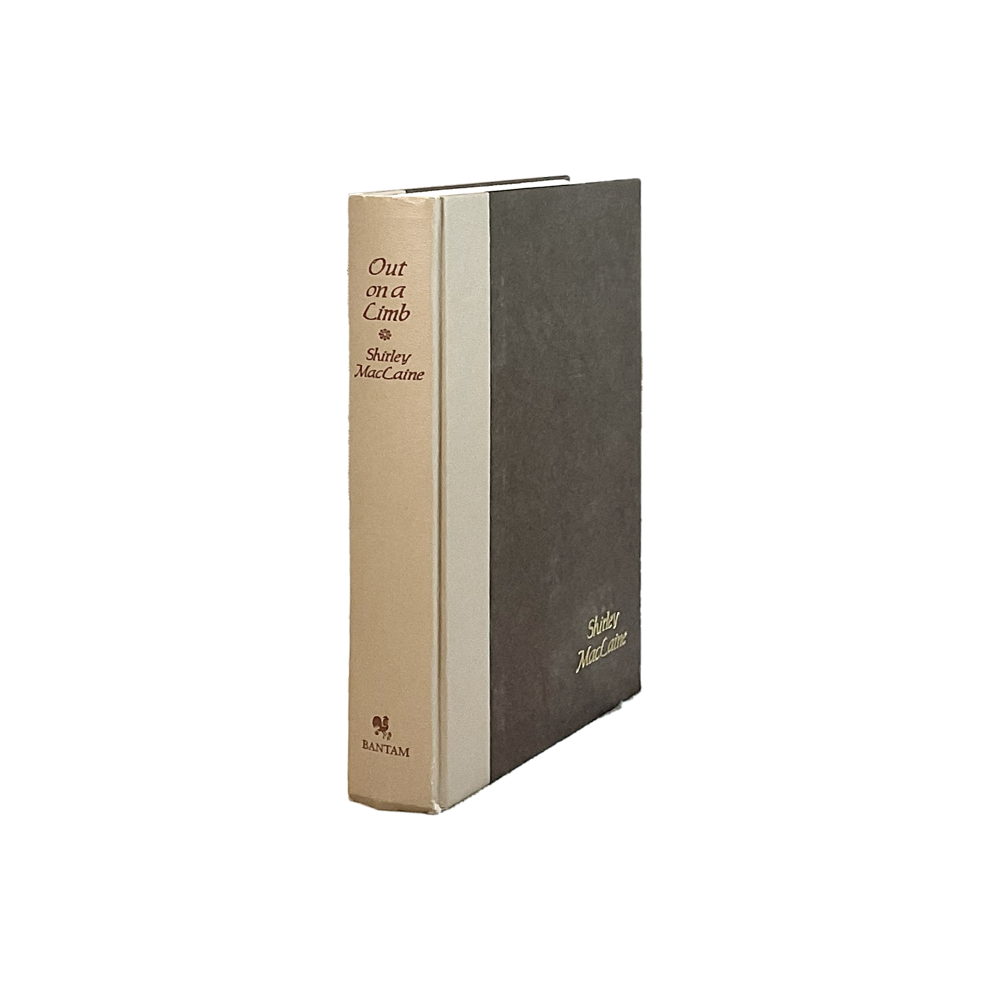 Book titled 'Out on a Limb' by Shirley MacLaine with a black and beige cover on a white background