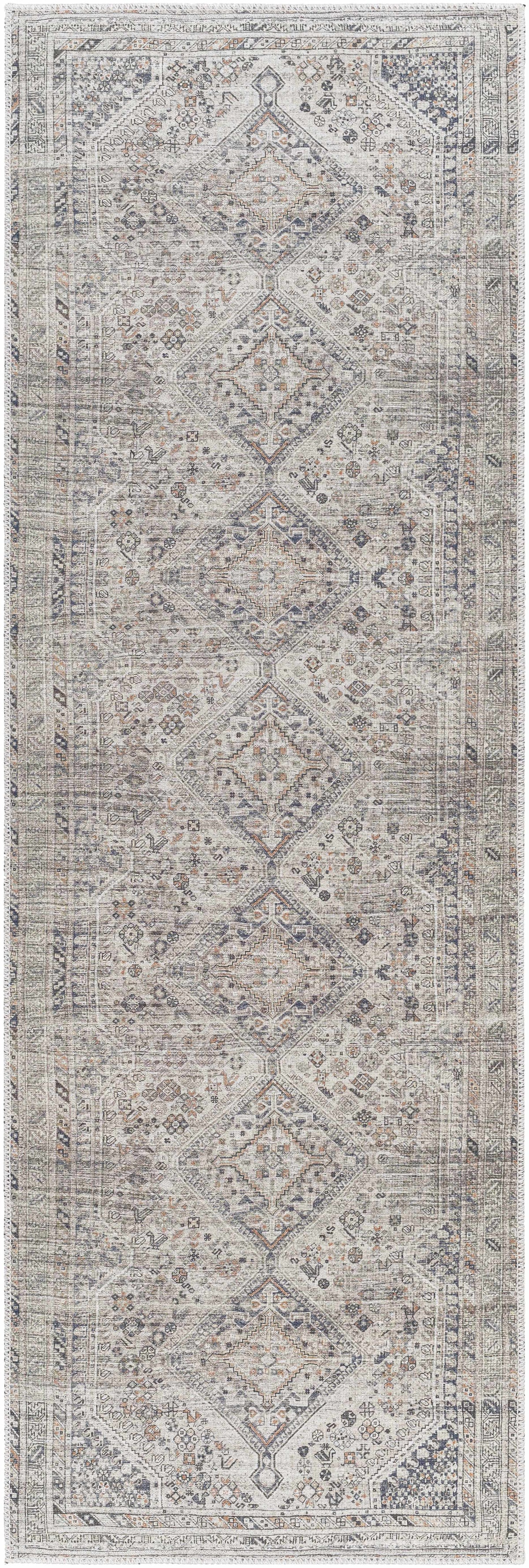 Gray and white patterned rug with subtle design