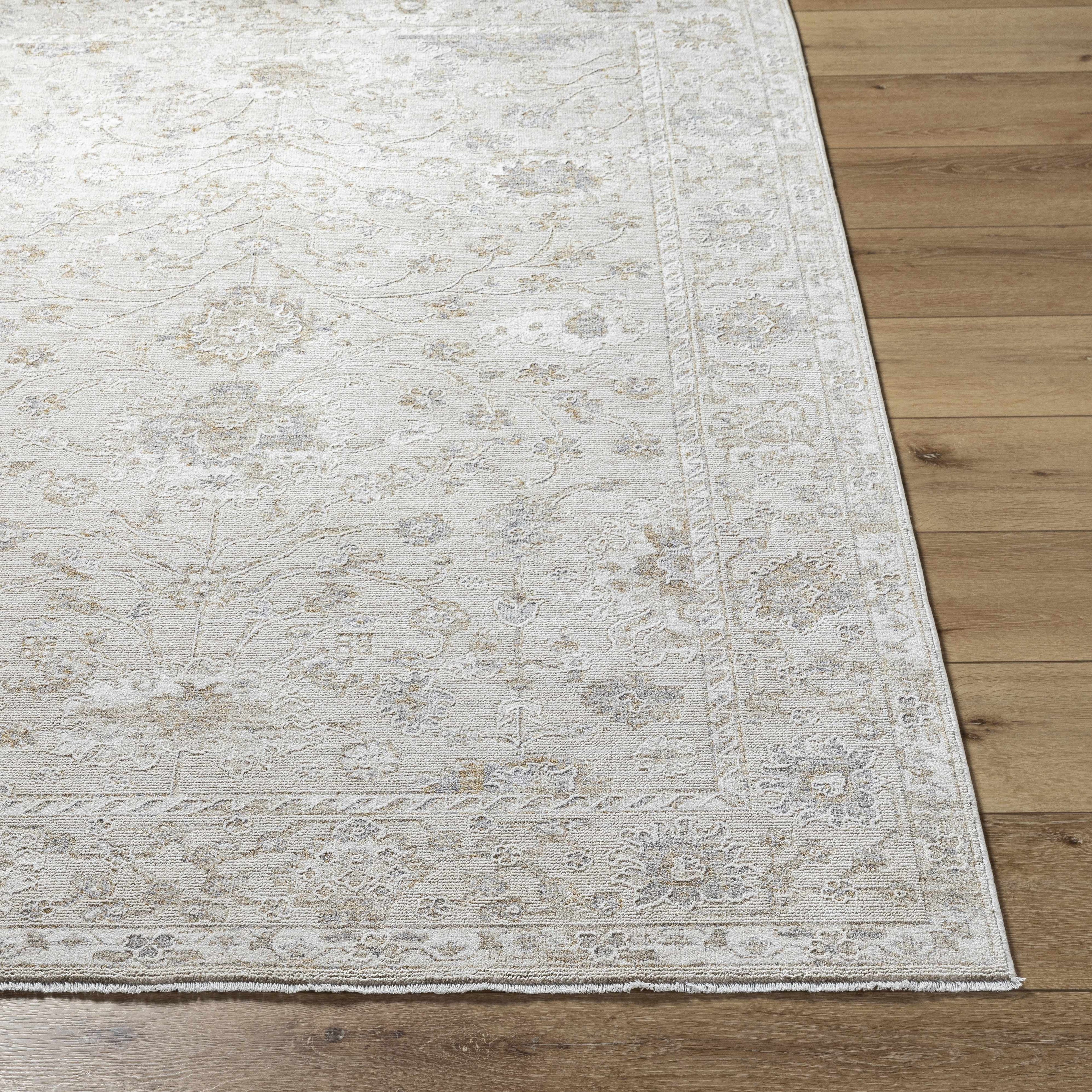 Textured area rug on a wooden floor