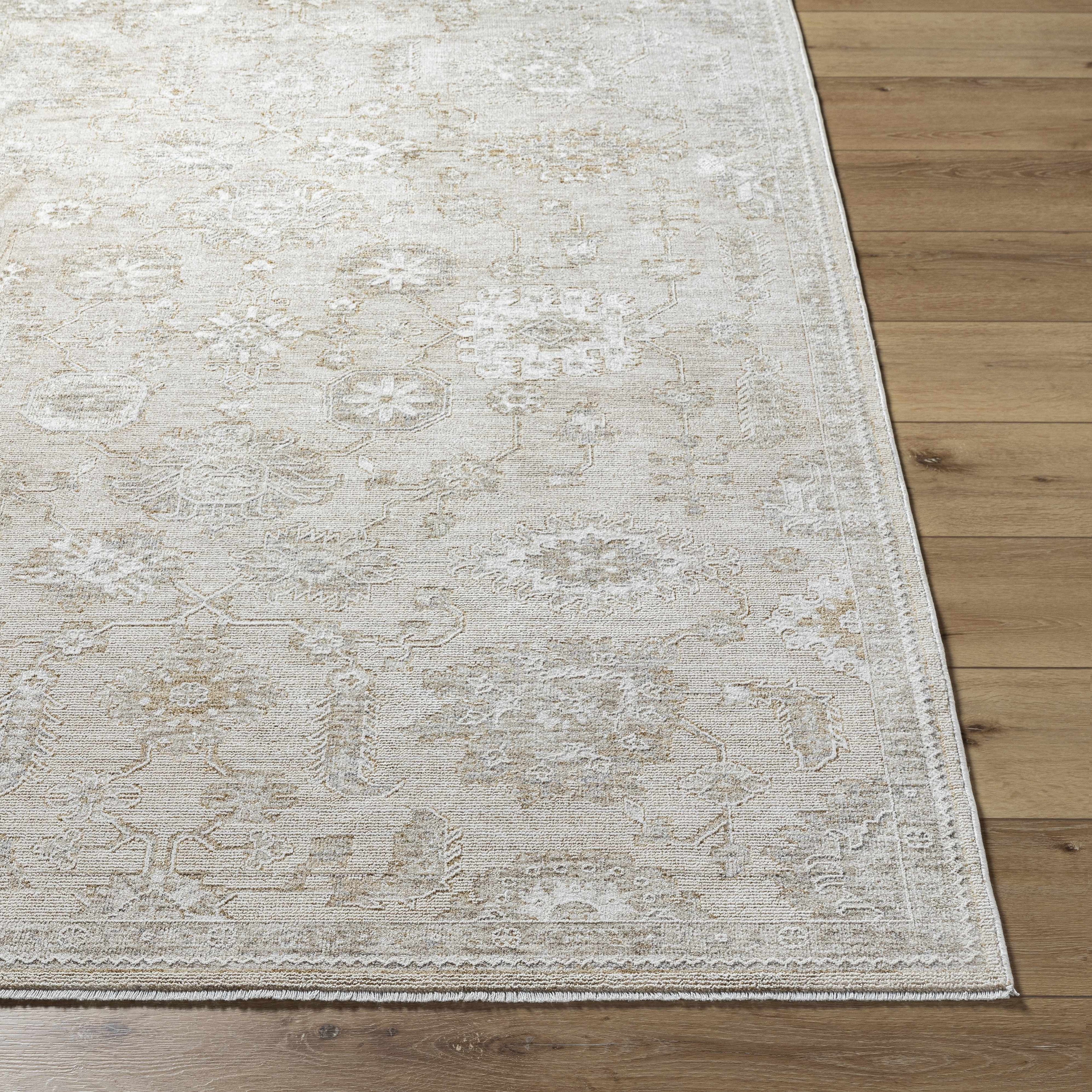 Textured area rug on a wooden floor